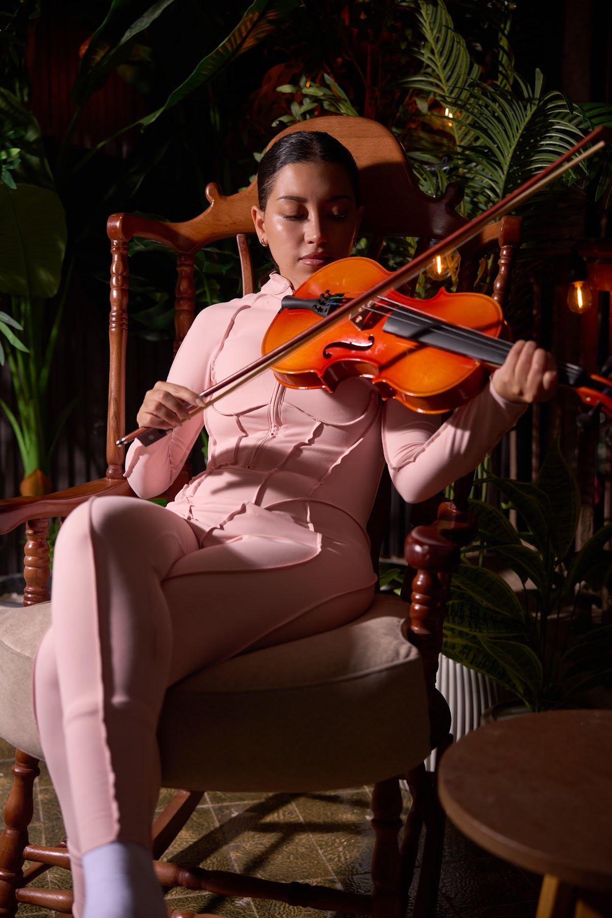 Pink suit with a violin